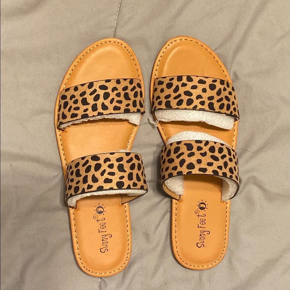 New, never used cheetah print dual strap sandals